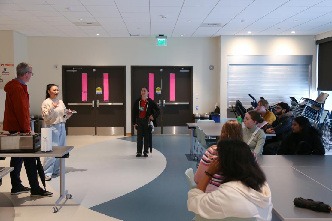 Students talking to Mercy Housing and Bellwether Housing staff about affordable housing.